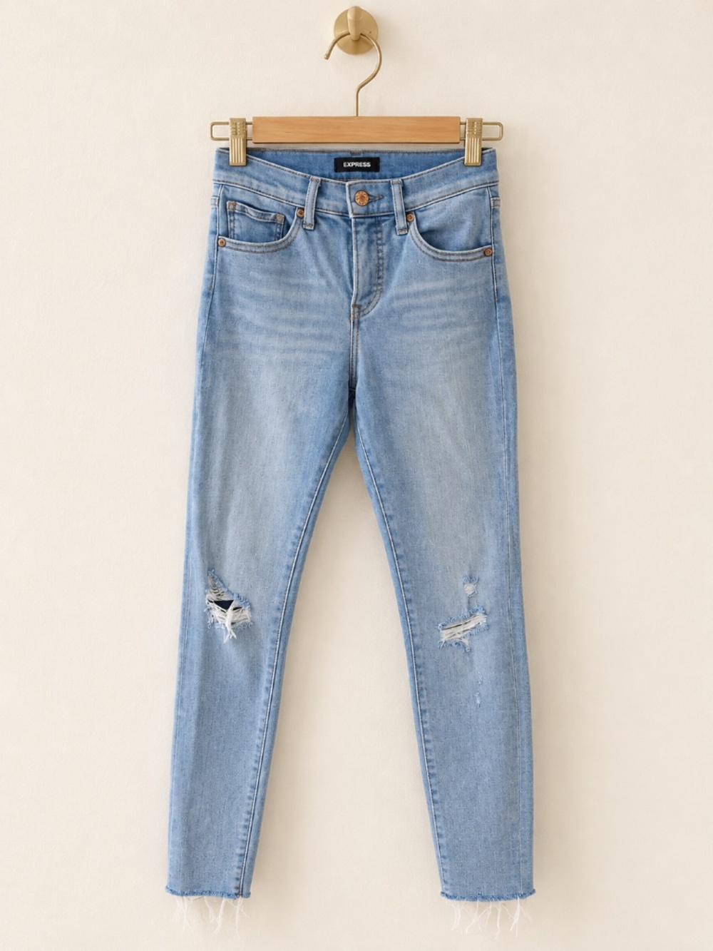 Express Women’s Size 4/R Skinny Jeans Light Wash Distressed Raw Hem